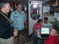 ARRL Rep John Stratton visits REACT station inside RV